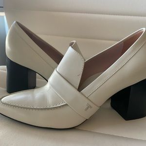 White block heel Taryn Rose heels.